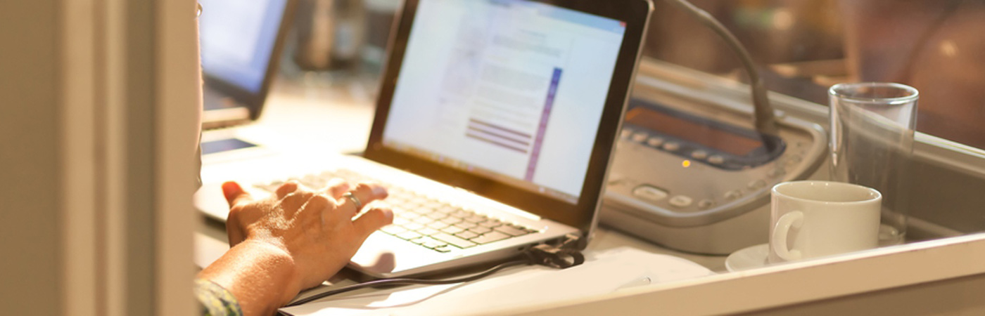 person working on laptop in office